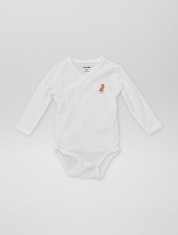 7 bodies com formato cruzado + bolsa de arrumação