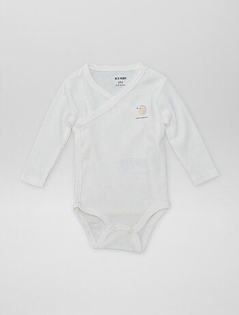 7 bodies com formato cruzado + bolsa de arrumação