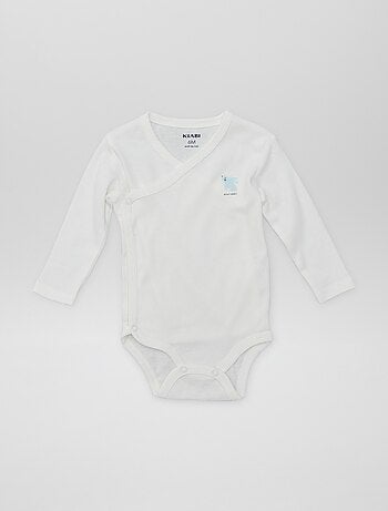 7 bodies com formato cruzado + bolsa de arrumação