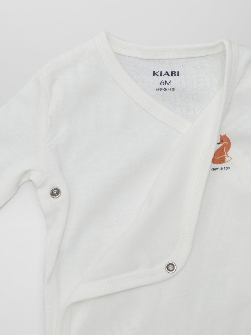 7 bodies com formato cruzado + bolsa de arrumação BRANCO - Kiabi