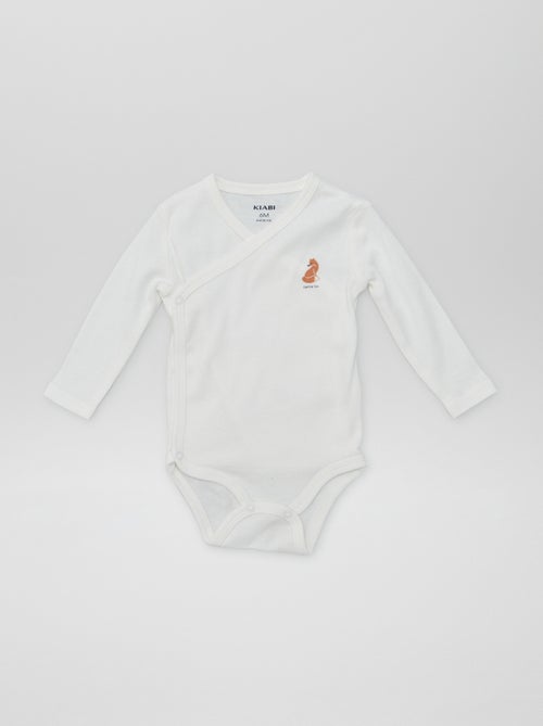 7 bodies em forma cruzada + bolsa de arrumação - Kiabi