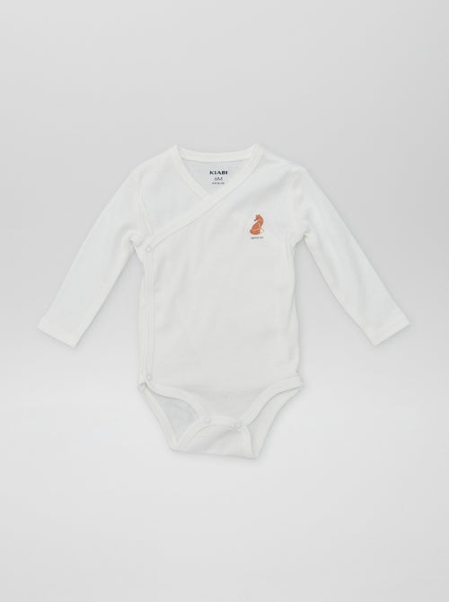 7 bodies em forma cruzada + bolsa de arrumação - Kiabi