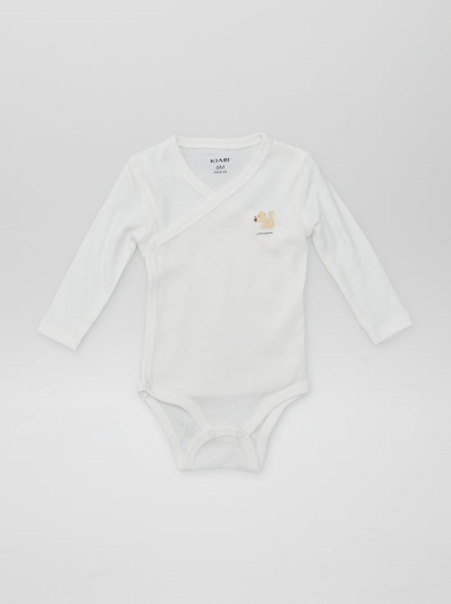 7 bodies em forma cruzada + bolsa de arrumação - Kiabi