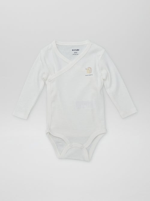 7 bodies em forma cruzada + bolsa de arrumação - Kiabi