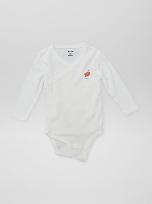 7 bodies em forma cruzada + bolsa de arrumação - Kiabi