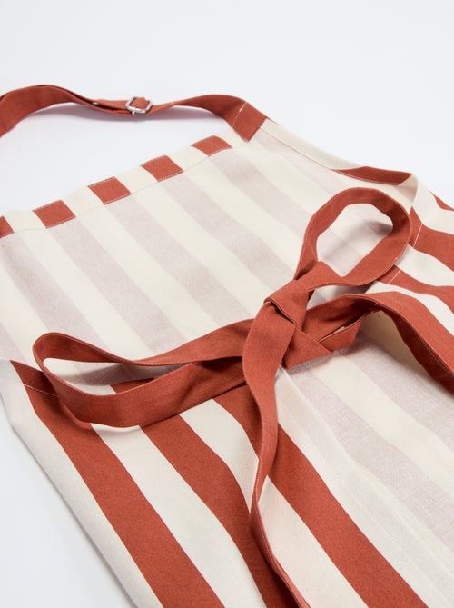 Avental às riscas com bolso bordado - Kiabi Avental às riscas com bolso bordado - Kiabi