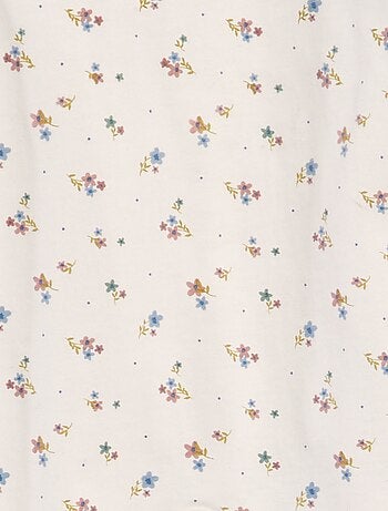 Babygrow estampado com pés