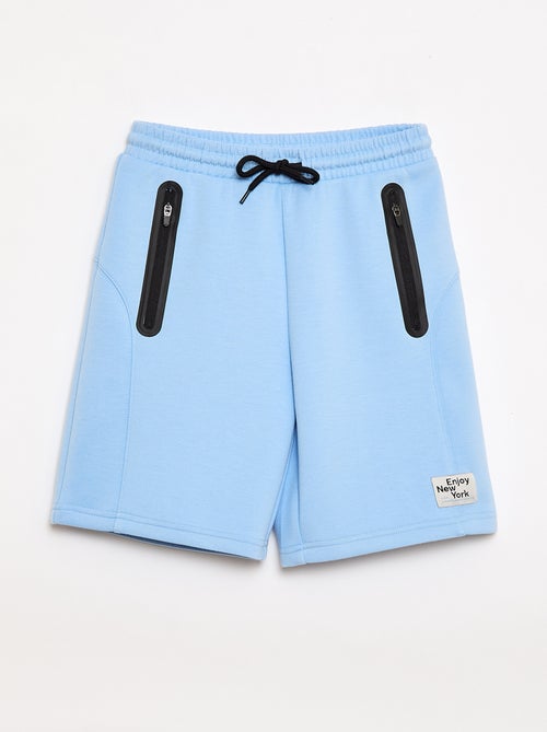 Bermuda de moletom com bolsos com zíper - Kiabi