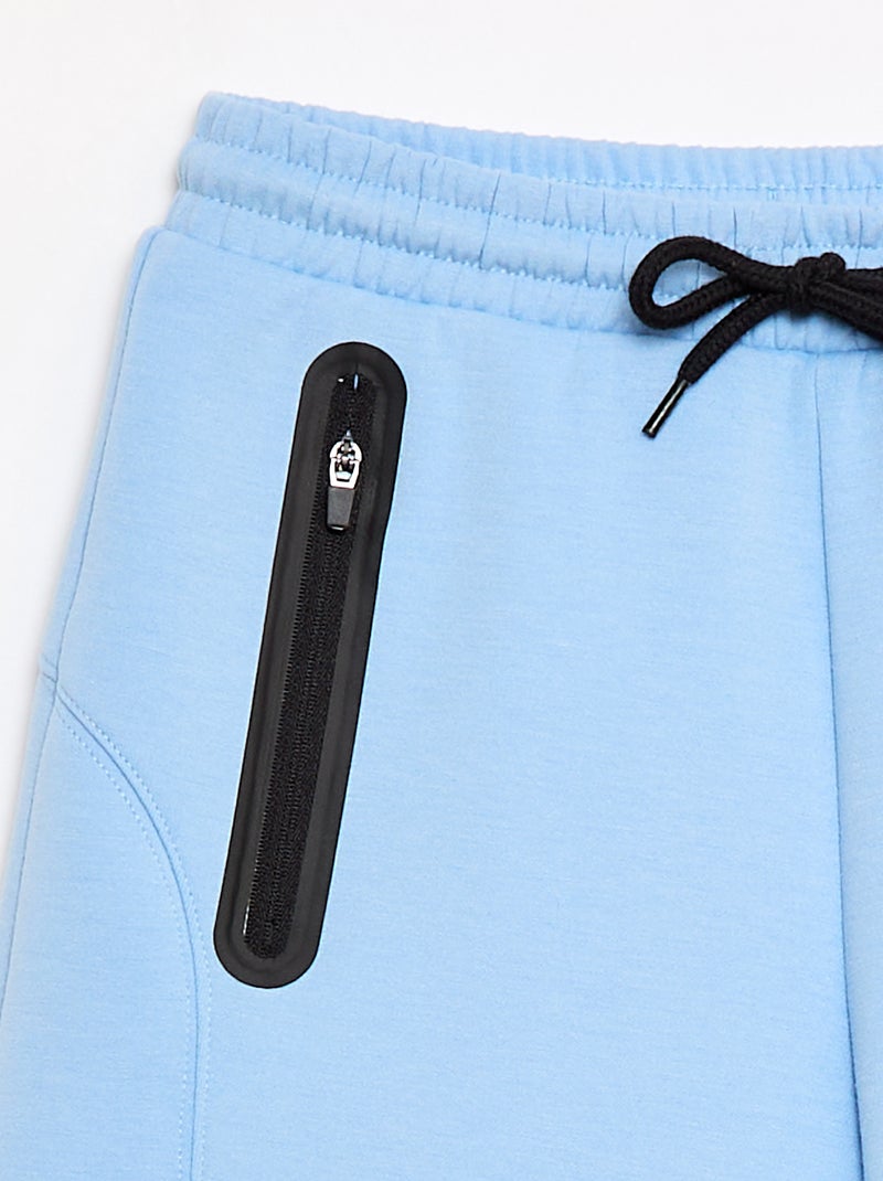 Bermuda de moletom com bolsos com zíper Bege - Kiabi