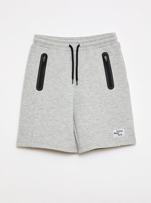 Bermuda de moletom com bolsos com zíper - Kiabi