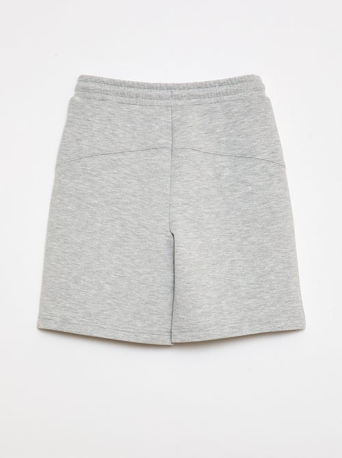 Bermuda de moletom com bolsos com zíper - Kiabi