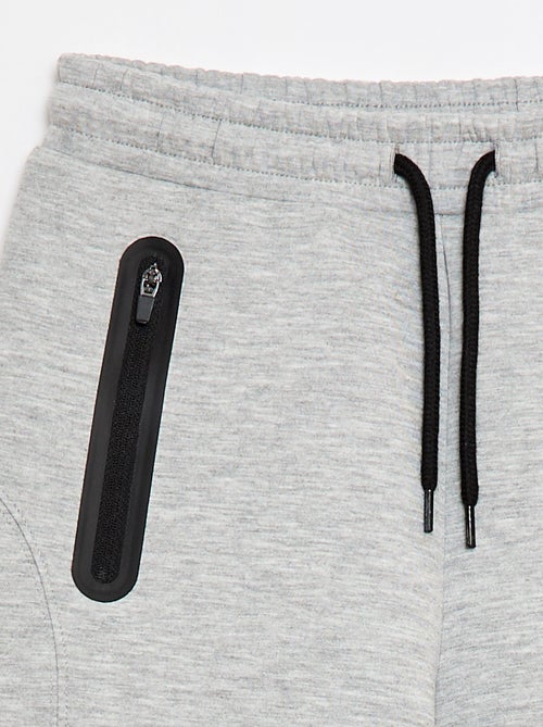 Bermuda de moletom com bolsos com zíper - Kiabi