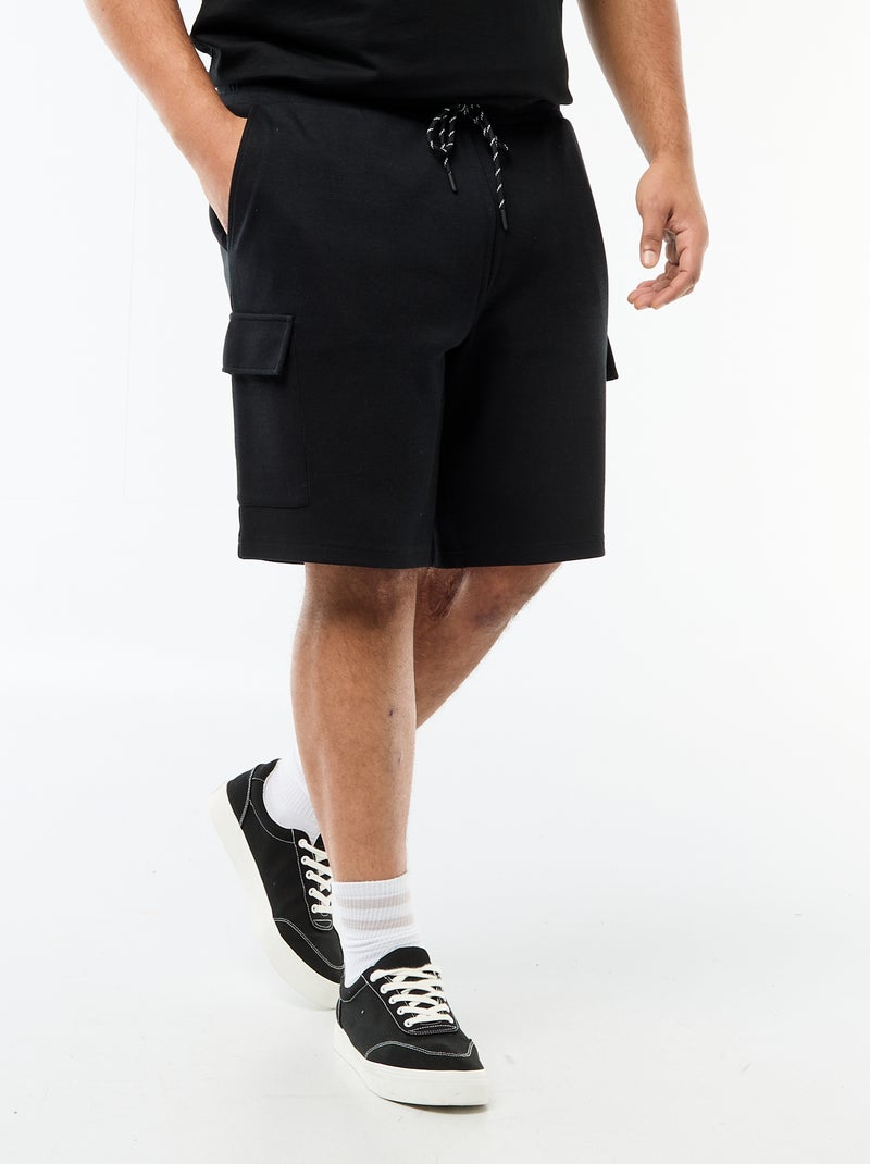 Bermuda em malha piqué com bolsos de aba Preto - Kiabi
