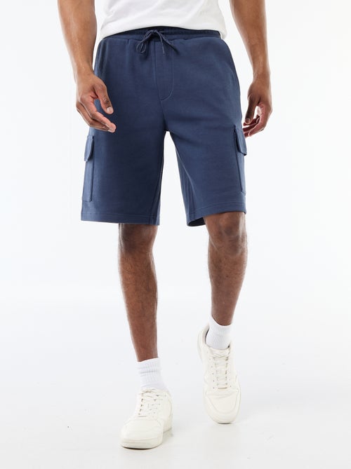 Bermuda em piqué de algodão com múltiplos bolsos - Kiabi Bermuda em piqué de algodão com múltiplos bolsos - Kiabi