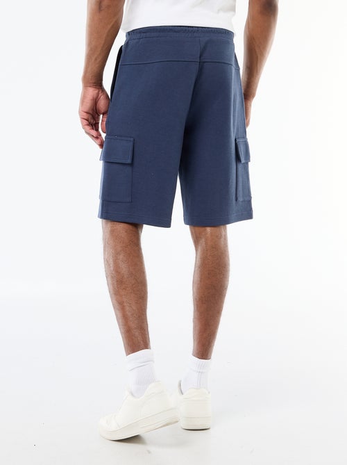 Bermuda em piqué de algodão com múltiplos bolsos - Kiabi Bermuda em piqué de algodão com múltiplos bolsos - Kiabi