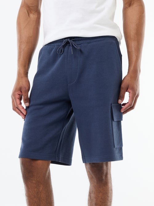 Bermuda em piqué de algodão com múltiplos bolsos - Kiabi Bermuda em piqué de algodão com múltiplos bolsos - Kiabi