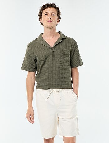 Bermudas chino em sarja
