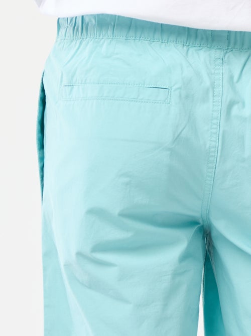 Bermudas chino lisas com atilhos de apertar - Kiabi Bermudas chino lisas com atilhos de apertar - Kiabi