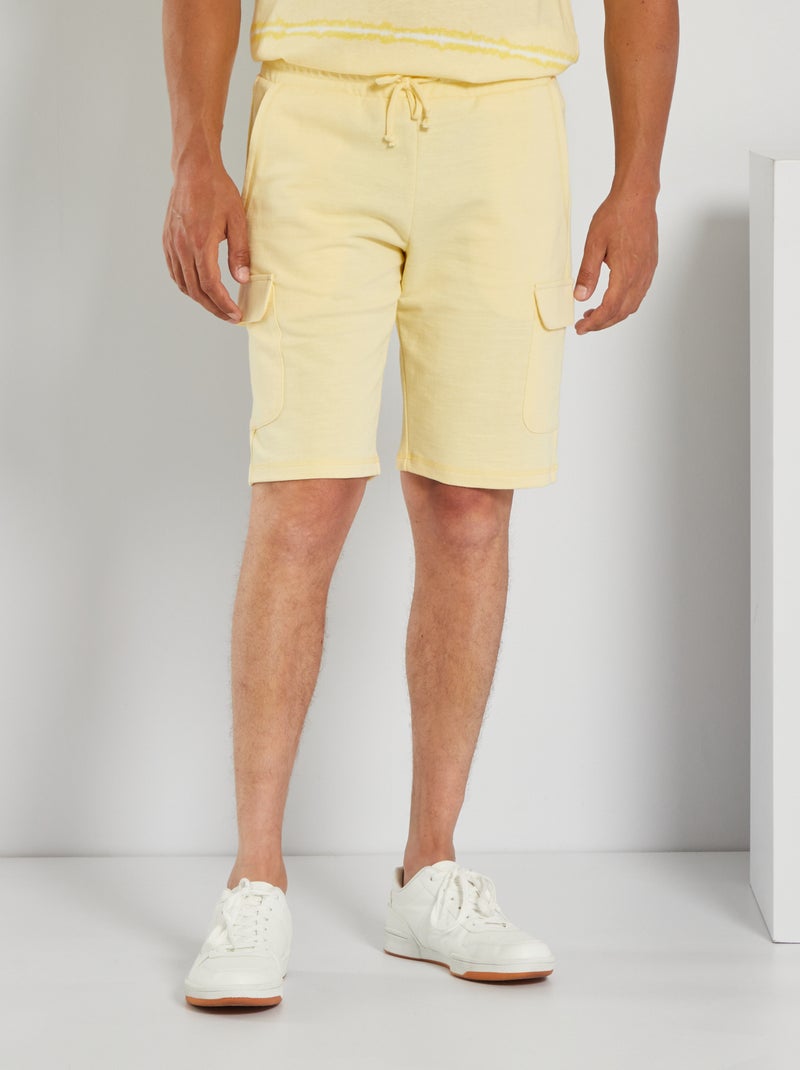 Bermudas em moletão com bolsos com aba AMARELO - Kiabi