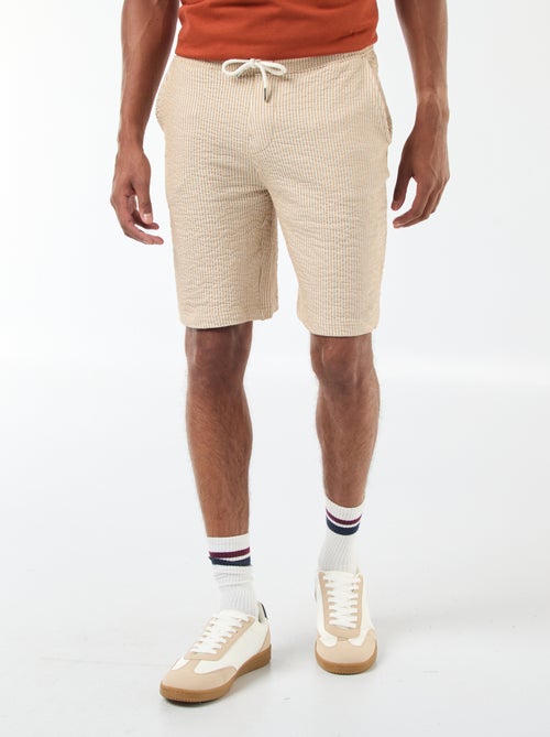 Bermudas material tipo crepe
às riscas - Kiabi Bermudas material tipo crepe
às riscas - Kiabi