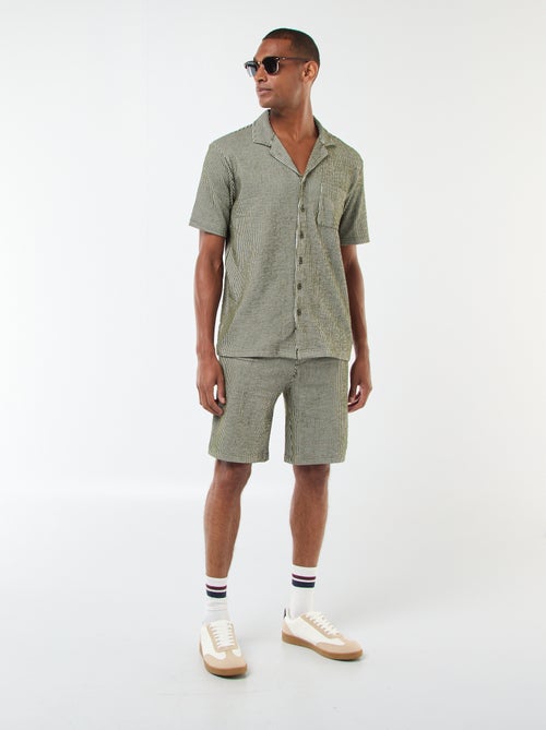 Bermudas material tipo crepe
às riscas - Kiabi Bermudas material tipo crepe
às riscas - Kiabi