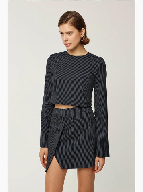Blusa às riscas com gola redonda hiccup - Kiabi Blusa às riscas com gola redonda hiccup - Kiabi