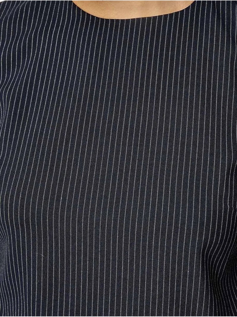 Blusa às riscas com gola redonda hiccup Preto - Kiabi
