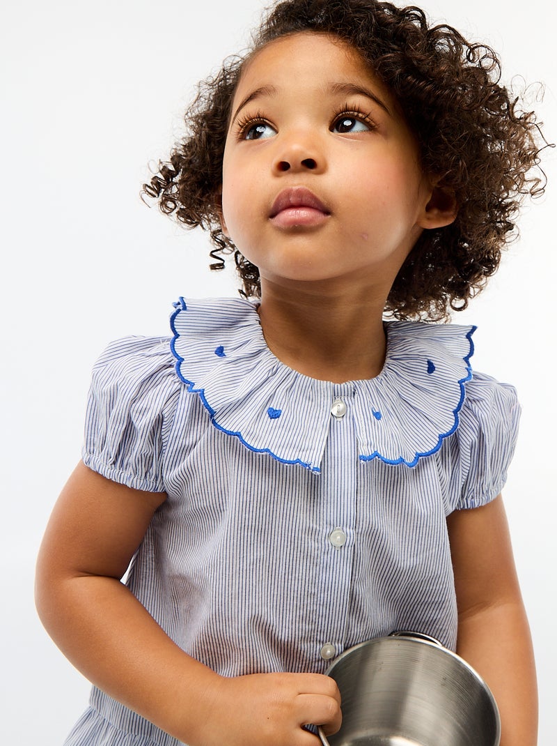 Blusa às riscas de manga curta e base com folhos Azul - Kiabi