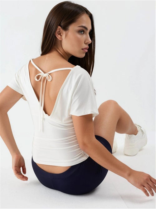 Blusa com decote em v e detalhe de laço busem - Kiabi