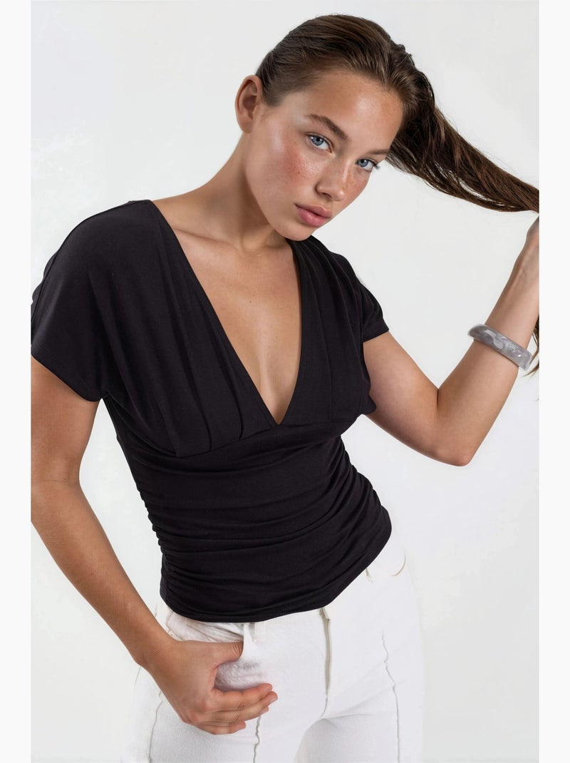 Blusa com decote em v e detalhe de laço busem Preto - Kiabi