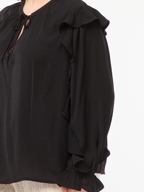 Blusa com ombros e punhos com folhos + atilhos na gola - Kiabi