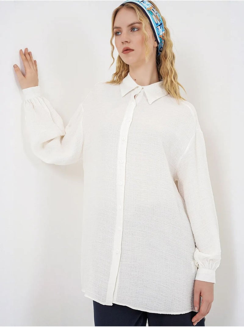 Blusa comprida oversize texturada com colarinho de camisa bdart Branco - Kiabi