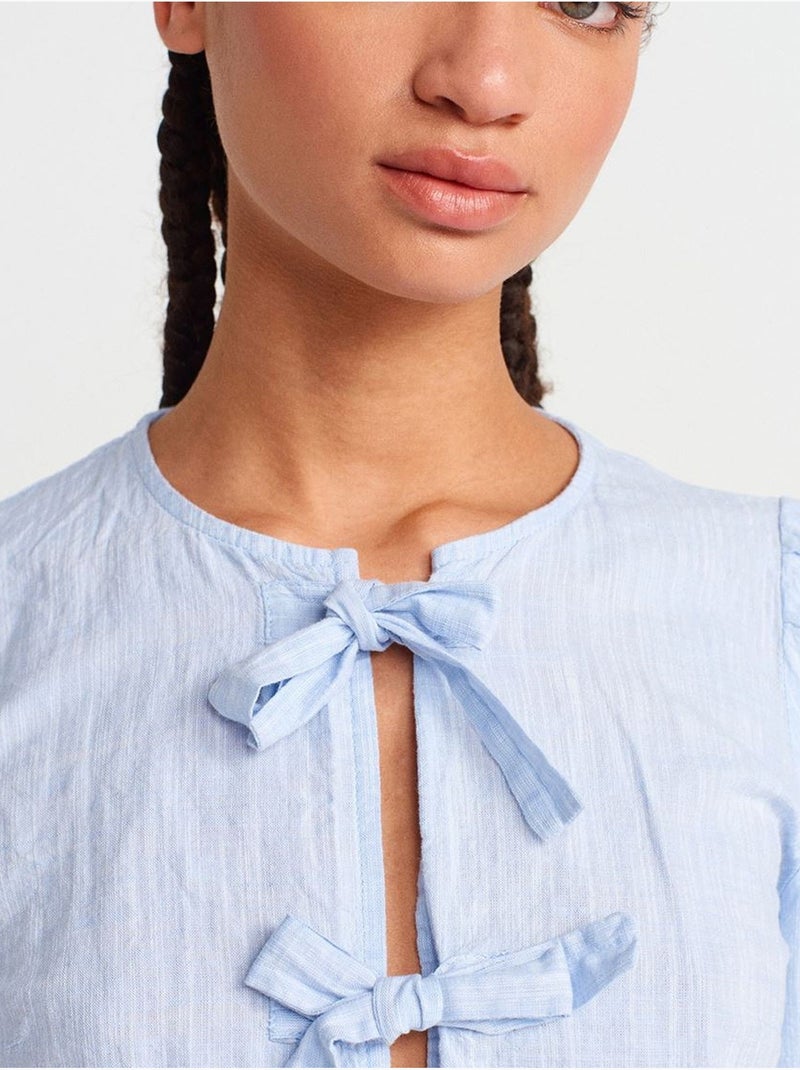Blusa crop de mulher com detalhe de laço dilvin Azul-pastel - Kiabi