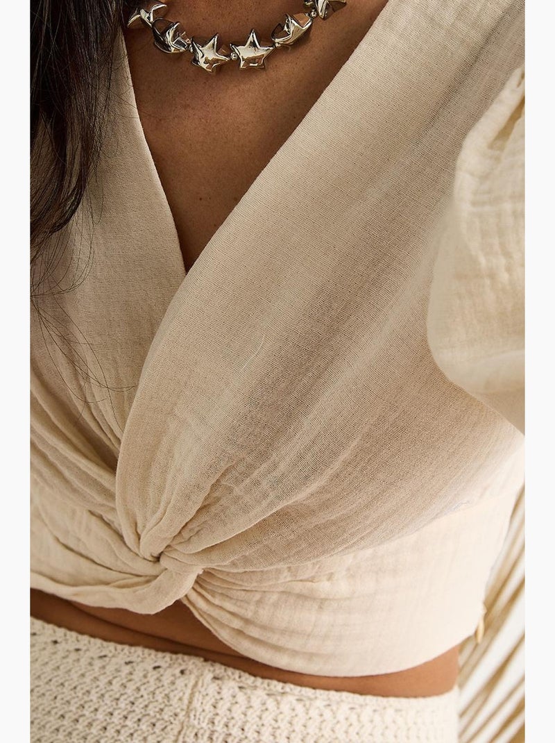 Blusa curta ajustada texturizada decote em v detalhe malha lucci Bege-argila - Kiabi