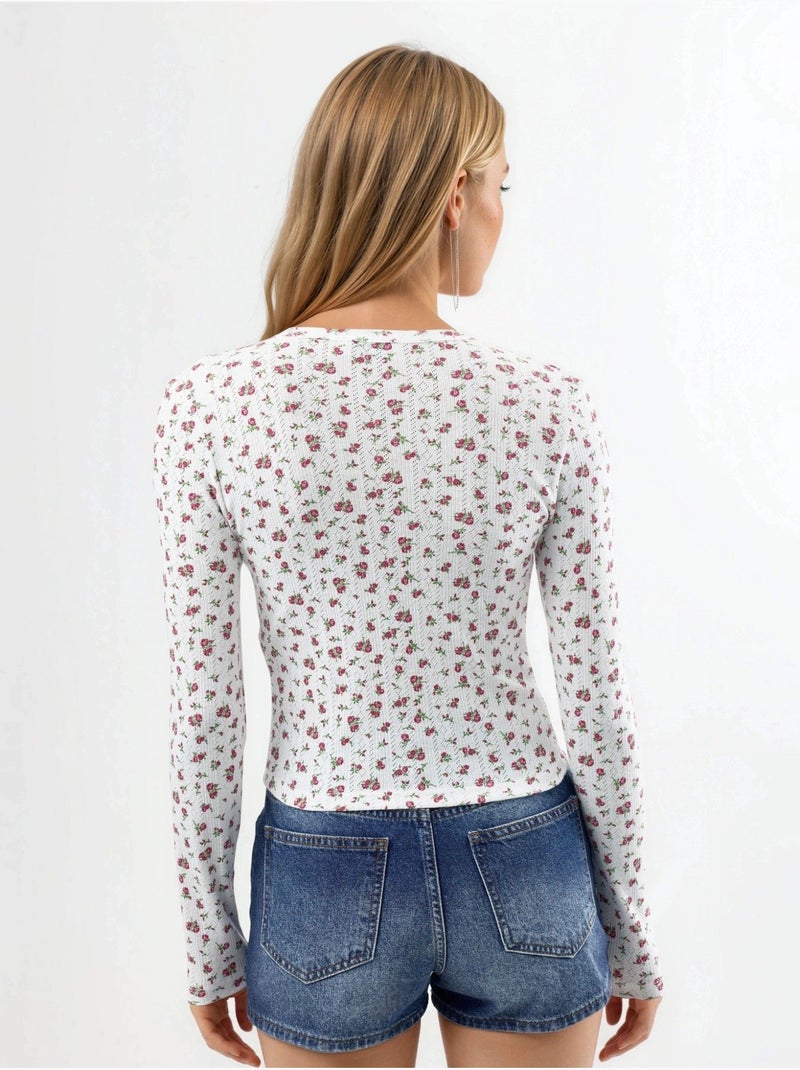 Blusa curta canelada de flores com fecho de botões busem Branco - Kiabi