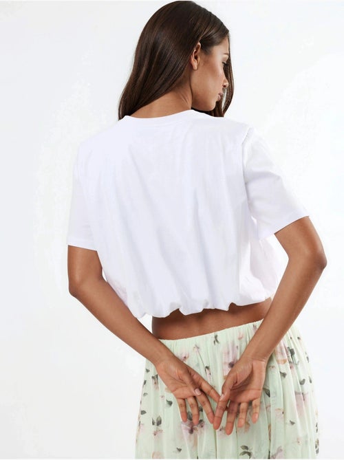 Blusa curta com gola redonda e elástico busem - Kiabi Blusa curta com gola redonda e elástico busem - Kiabi