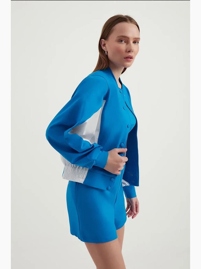 Blusa de fato de treino com botões e gola alta em blocos de cor hiccup Azul - Kiabi