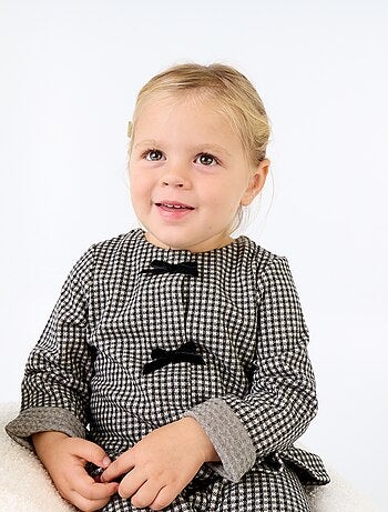 Blusa de flanela com laços e base com folhos