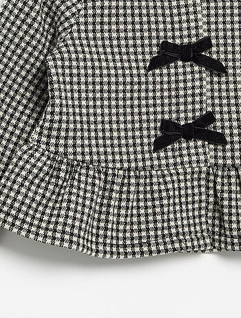 Blusa de flanela com laços e base com folhos