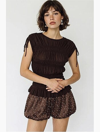 Blusa de malha ajustada sem mangas com detalhe de amarração lucci