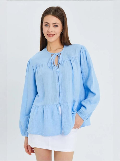 Blusa de manga comprida de corte descontraído com laço no decote mixray - Kiabi Blusa de manga comprida de corte descontraído com laço no decote mixray - Kiabi