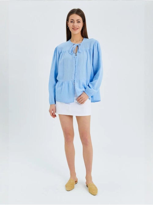 Blusa de manga comprida de corte descontraído com laço no decote mixray - Kiabi Blusa de manga comprida de corte descontraído com laço no decote mixray - Kiabi