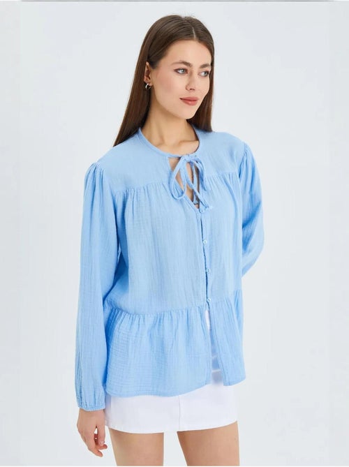 Blusa de manga comprida de corte descontraído com laço no decote mixray - Kiabi Blusa de manga comprida de corte descontraído com laço no decote mixray - Kiabi