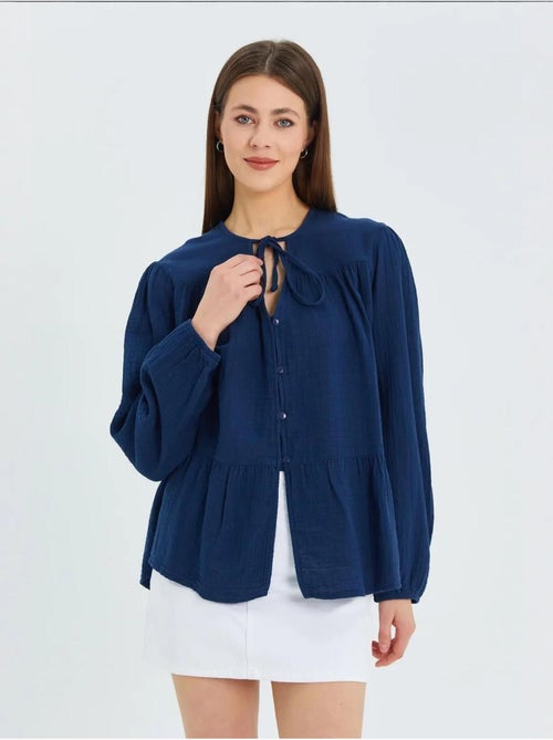 Blusa de manga comprida de corte descontraído com laço no decote mixray - Kiabi Blusa de manga comprida de corte descontraído com laço no decote mixray - Kiabi