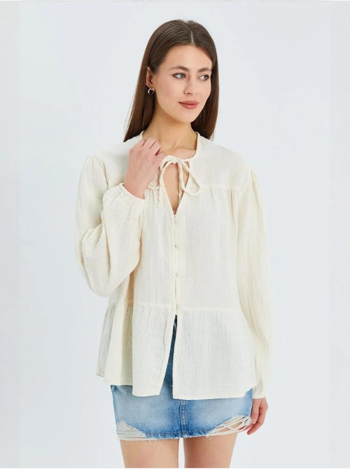 Blusa de manga comprida de corte descontraído com laço no decote mixray - Kiabi Blusa de manga comprida de corte descontraído com laço no decote mixray - Kiabi