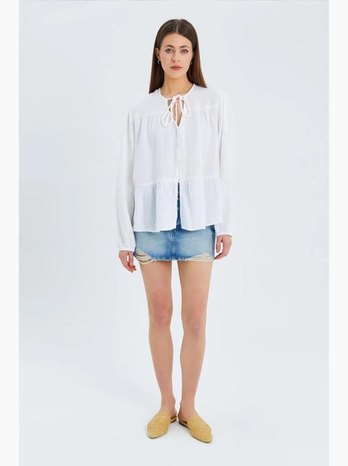Blusa de manga comprida de corte descontraído com laço no decote mixray - Kiabi Blusa de manga comprida de corte descontraído com laço no decote mixray - Kiabi