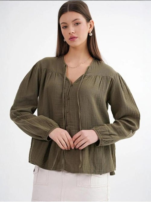 Blusa de manga comprida de corte descontraído com laço no decote mixray - Kiabi Blusa de manga comprida de corte descontraído com laço no decote mixray - Kiabi