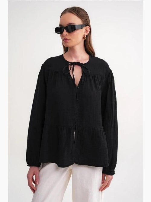 Blusa de manga comprida de corte descontraído com laço no decote mixray - Kiabi Blusa de manga comprida de corte descontraído com laço no decote mixray - Kiabi