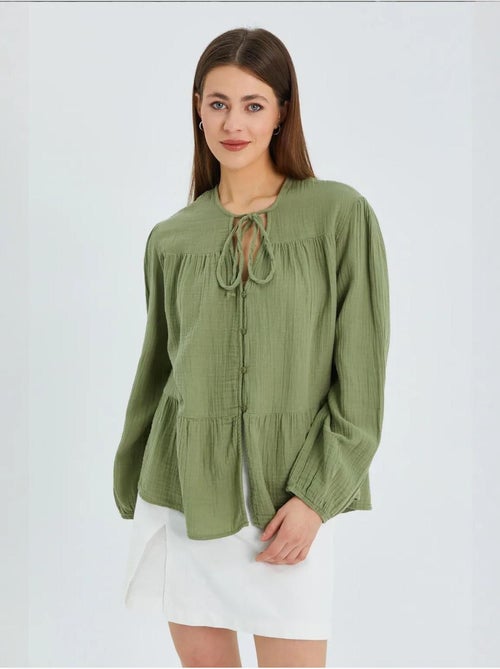 Blusa de manga comprida de corte descontraído com laço no decote mixray - Kiabi Blusa de manga comprida de corte descontraído com laço no decote mixray - Kiabi