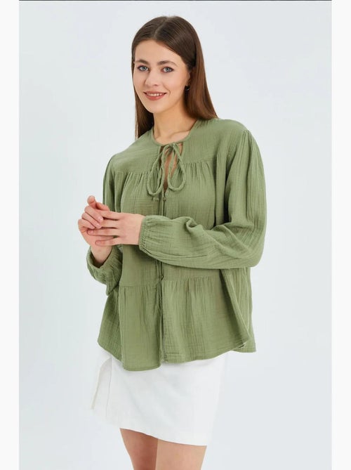 Blusa de manga comprida de corte descontraído com laço no decote mixray - Kiabi Blusa de manga comprida de corte descontraído com laço no decote mixray - Kiabi